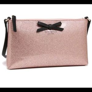 Like NEW rose gold Kate Spade mini purse! So cute!